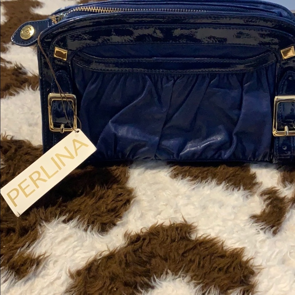 Perlina clutch NWT 💙